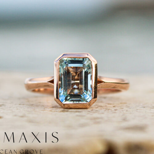 Rose Gold Solitaire Bezel Set Emerald Cut Aquamarine Cocktail Ring